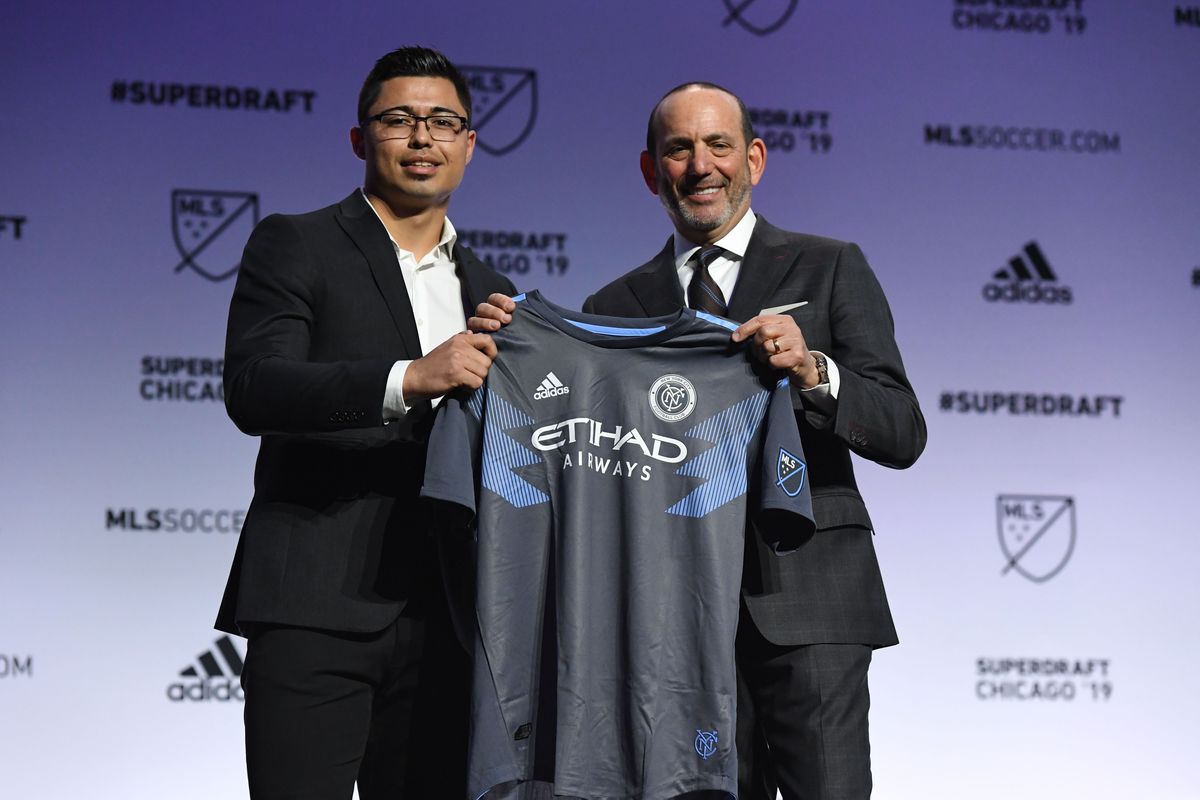 Luis Barraza greets MLS commissioner Don Garber after being selected as the number twelve overall pick to New York City FC in the first round of the 2019 MLS Super Draft
