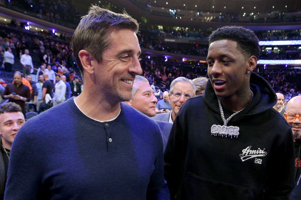 May 2, 2023; New York, New York, USA; New York Jets quarterback Aaron Rodgers (left) and cornerback Sauce Gardner walk off the court after game two of the 2023 NBA Eastern Conference semifinal playoffs between the New York Knicks and the Miami Heat at Madison Square Garden. Mandatory Credit: Brad Penner-USA TODAY Sports (NFL)