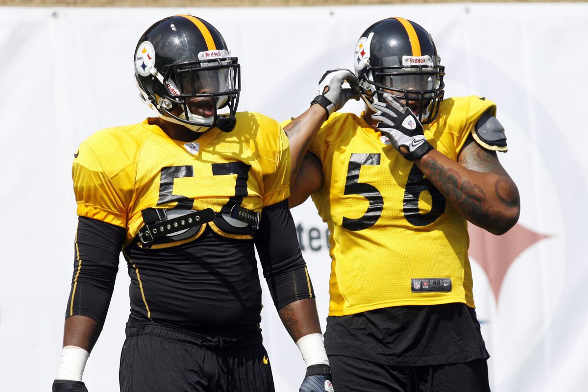 July 28, 2012; Pittsburgh, PA, USA; Pittsburgh Steelers linebackers Mortty Ivy (57) and LaMarr Woodley (56) wait their turn to participate in a drill during training camp at Saint Vincent College. Mandatory Credit: Charles LeClaire-US PRESSWIRE
