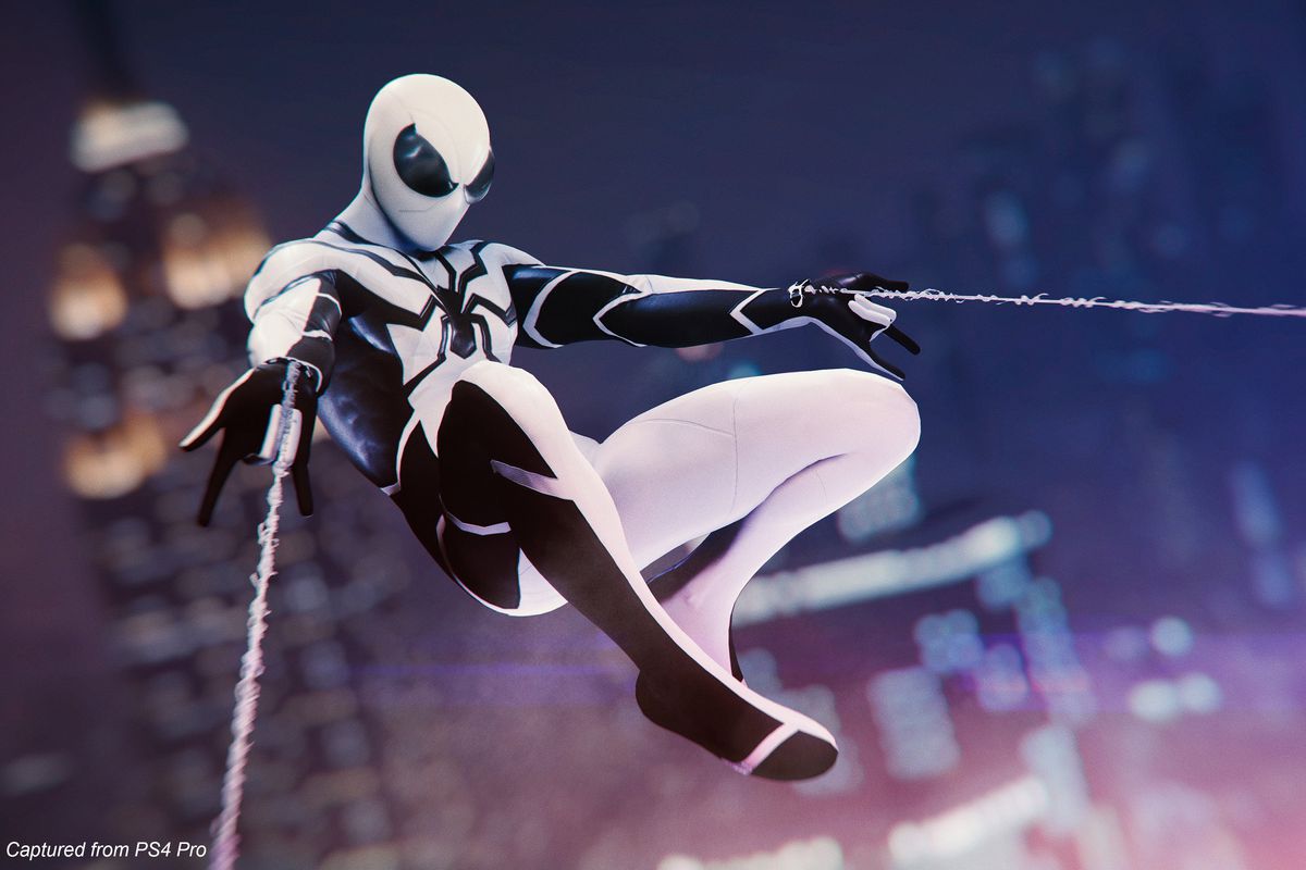 Spider-Man swings over New York in his Future Foundation costume in a screenshot from Marvel’s Spider-Man for PS4.