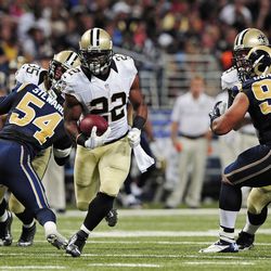 Aug 8, 2014; St. Louis, MO, USA; New Orleans Saints running back Mark Ingram (22) rushes for a 22 yard touchdown during the first half against the St. Louis Rams at Edward Jones Dome. Mandatory Credit: Jeff Curry-USA TODAY Sports