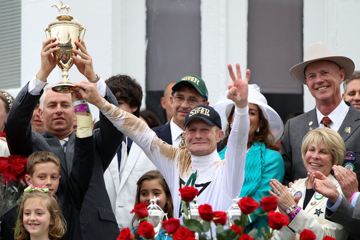 LOUISVILLE, KY - MAY 01:  Jockey Calvin Borel holds the 136th Kentucky Derby trophy with trainer Todd Pletcher after winning atop Super Saver on May 1, 2010 in Louisville, Kentucky.  (Photo by Jamie Squire/Getty Images)