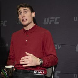 Darren Till answers a question at UFC 228 media day.