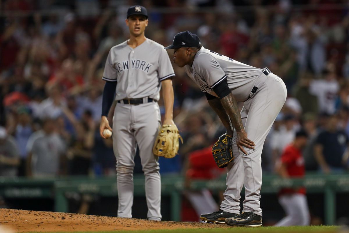 Aroldis Chapman reacts after giving up the tying run during the ninth inning against the Boston Red Sox at Fenway Park. 