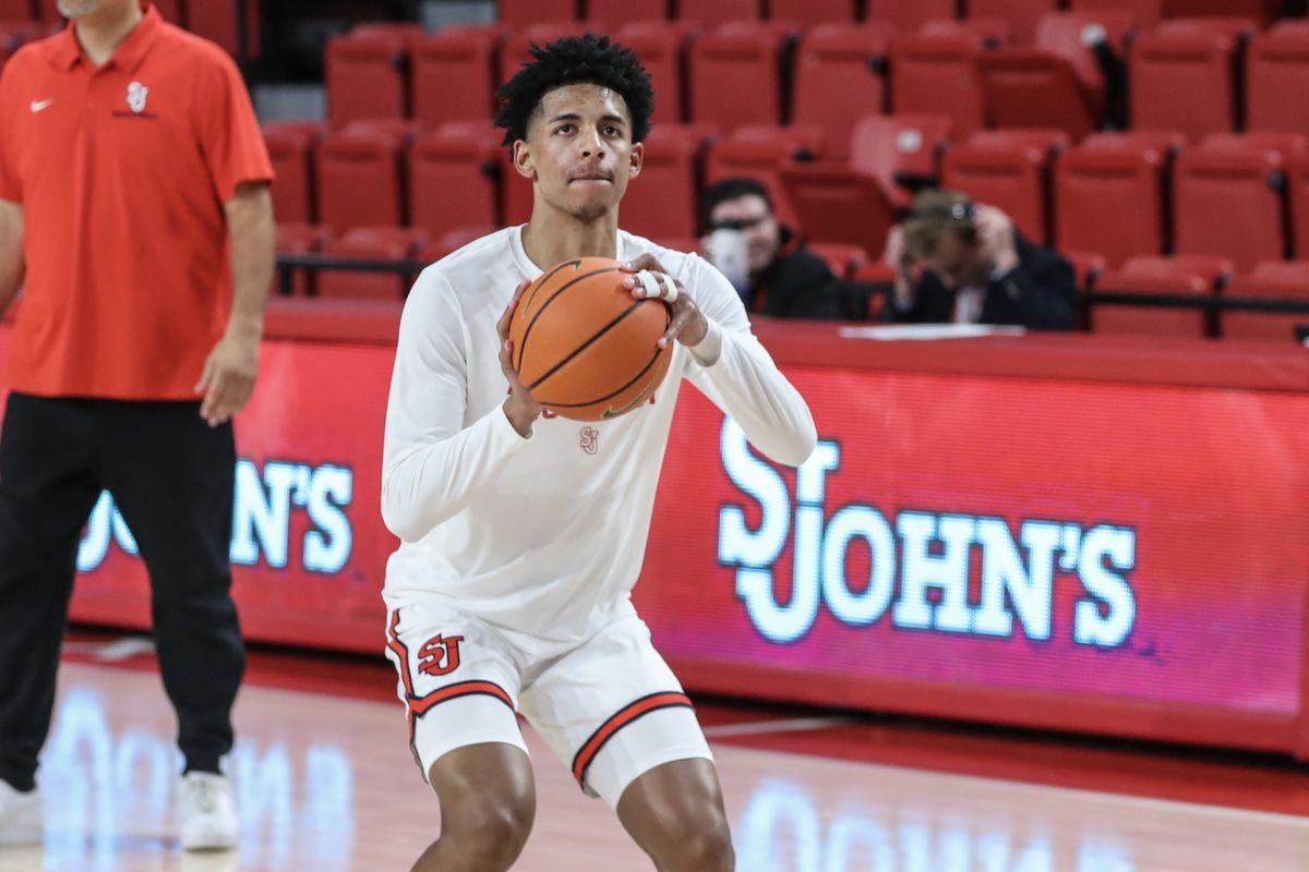 St. John’s guard RJ Luis (12) warms up prior to the game against the Holy Cross Crusaders at Carnesecca Arena.