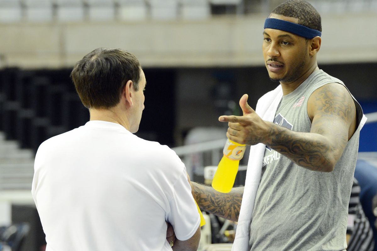 July 23, 2012; Barcelona, SPAIN; USA head coach Mike Krzyzewski (left) talks with player Carmelo Anthony (right) during practice in preparation for the 2012 London Olympic Games at Palau Sant Jordi.  Mandatory Credit: Bob Donnan-US PRESSWIRE