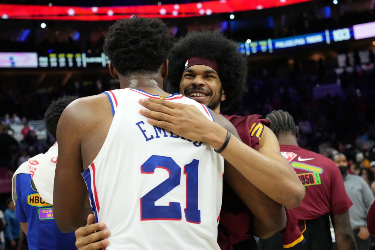 Joel Embiid #21 of the Philadelphia 76ers and Jarrett Allen #31 of the Cleveland Cavaliers embrace after the game on February 12, 2022 at the Wells Fargo Center in Philadelphia, Pennsylvania. 