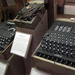 File picture, showing a four-rotor Enigma machine, right, once used by the crews of German U-boats in World War II to send coded messages, which British World War II code-breaker mathematician Alan Turing, was instrumental in breaking, and which is widely thought to have been a turning point in the war. 