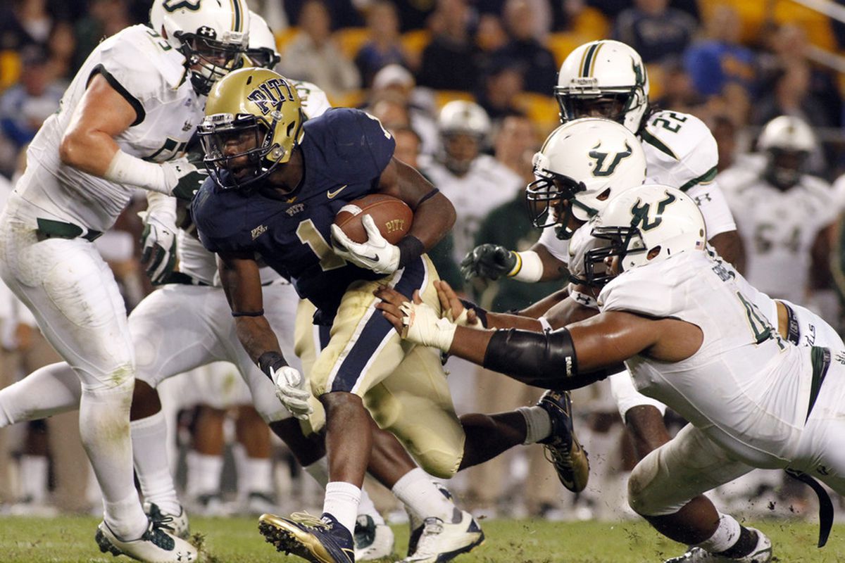 #22 George Baker pursues the play against Pitt.