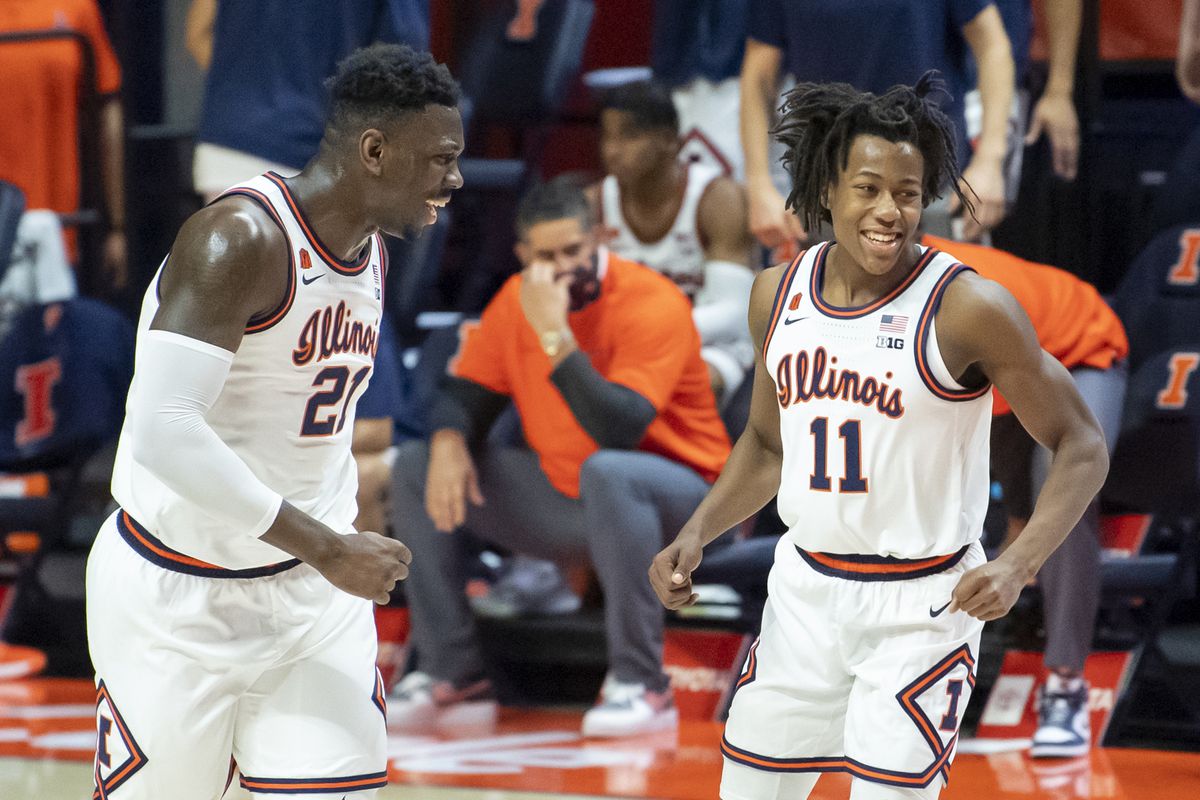 Illinois Fighting Illini center Kofi Cockburn and guard Ayo Dosunmu celebrate during the first half against the Purdue Boilermakers at the State Farm Center.