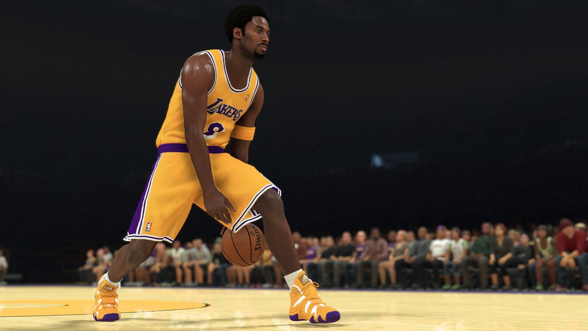 Kobe Bryant dribbles between his legs as he prepares a drive to the basket.