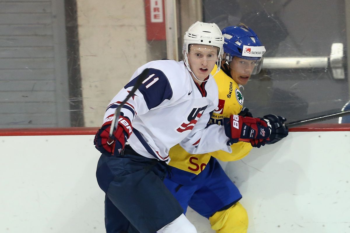 Kyle Connor along the boards during the 2014 World Juniors.