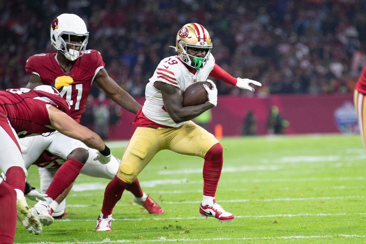 Deebo Samuel #19 of the San Francisco 49ers runs after making a catch during the game against the Arizona Cardinals at Estadio Azteca on November 21, 2022 in Mexico City, Mexico.