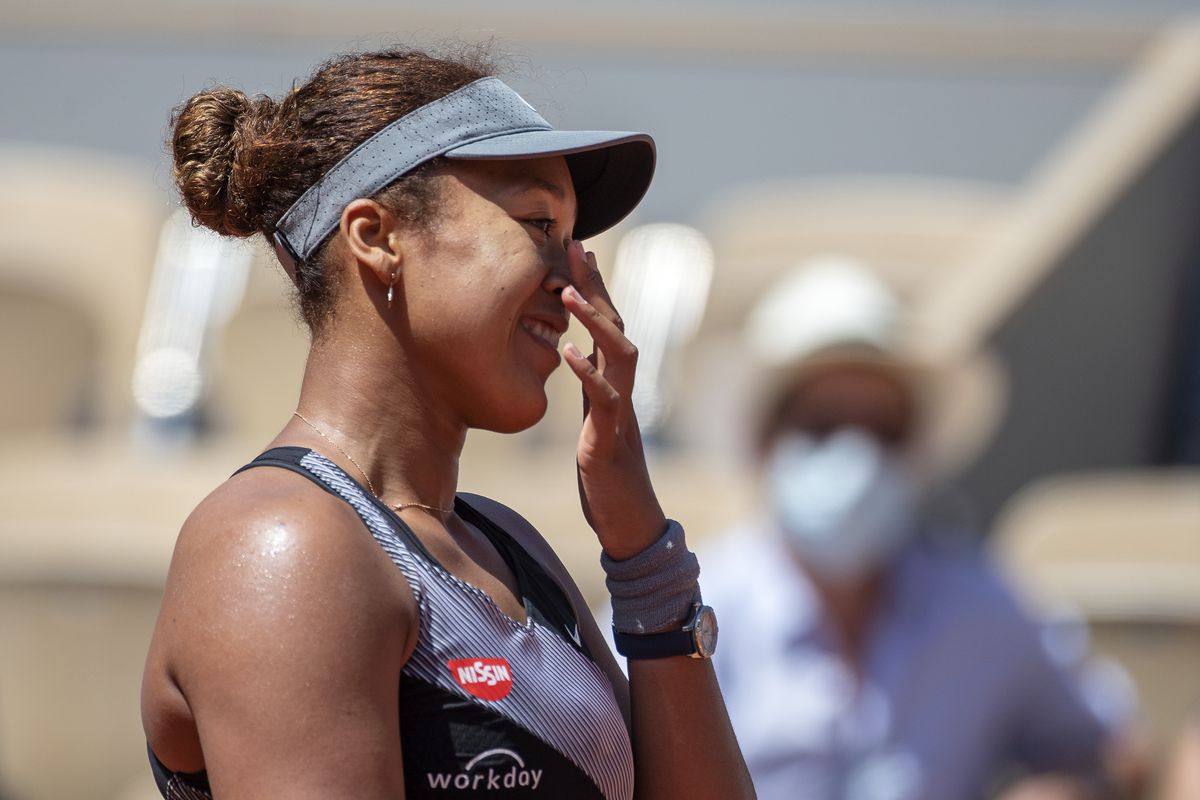 Naomi Osaka of Japan celebrates her victory against Patricia Maria Tig of Romania in the first round of the Women’s Singles competition on Court Philippe-Chatrier at the 2021 French Open Tennis Tournament at Roland Garros on May 30th 2021 in Paris, France.