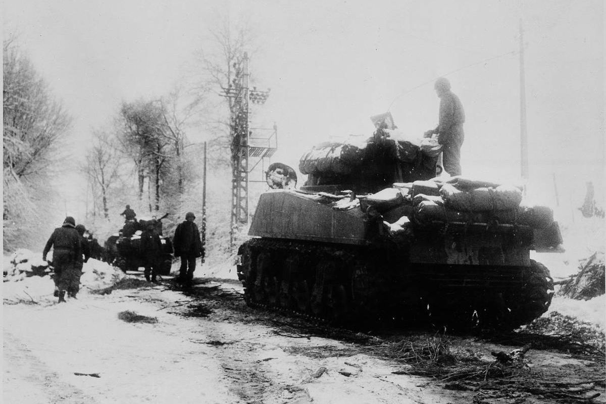 U.S. tanks move in the snow and ice from the town of Tri-le-Cheslaing, Belgium, on Jan. 7, 1945 during the Battle of the Bulge in World War II. 