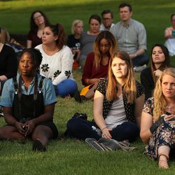 About 100 people attend a solidarity vigil to stand against white supremacy and racism hosted by BYU college Republican and Democrat clubs in Provo on Sunday, Aug. 20, 2017.