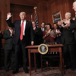 FILE - President Donald Trump acknowledge applause after signing an Antiquities Executive Order during a ceremony at the Interior Department in Washington, Wednesday, April, 26, 2017.