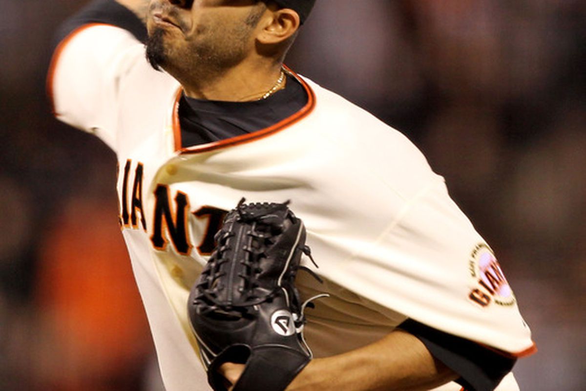 SAN FRANCISCO - APRIL 12:  Sergio Romo #54 of the San Francisco Giants pitches against the Pittsburgh Pirates at AT&T Park on April 12, 2010 in San Francisco, California.  (Photo by Ezra Shaw/Getty Images)