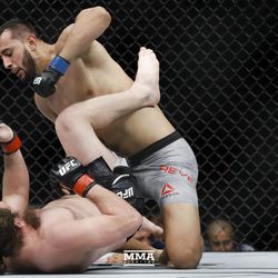 Dominick Reyes punches Jeremy Kimball at UFC 218.
