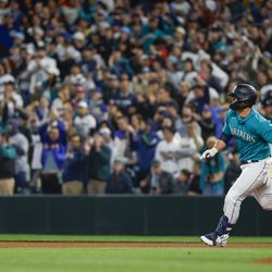 Seattle Mariners first baseman Ty France (23) advances to second base for a two-run double against the Colorado Rockies during the fourth inning at T-Mobile Park.
