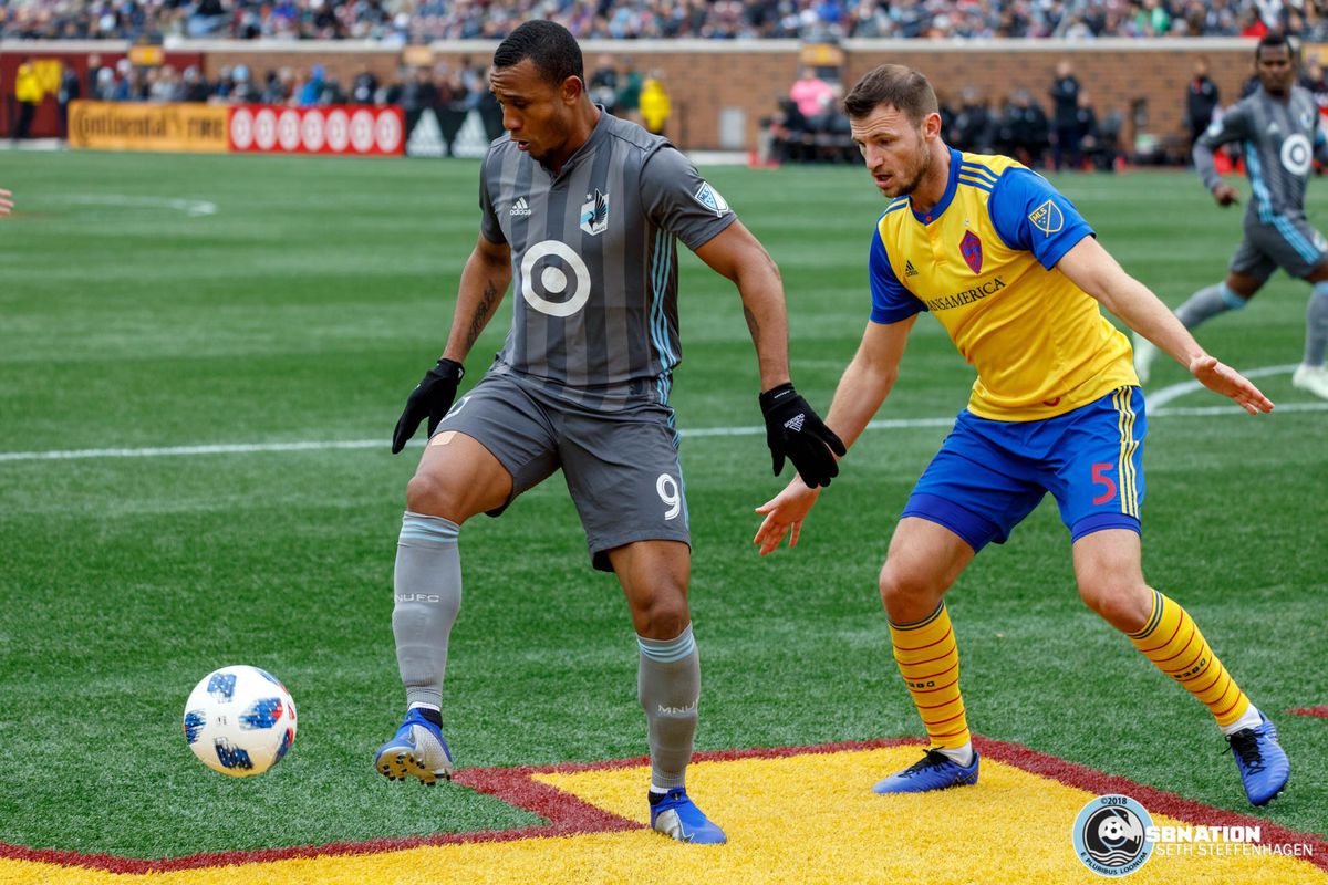 October 13, 2018 - Minneapolis, Minnesota, United States - Minnesota United forward Angelo Rodriguez (9) is marked by Colorado Rapids defender Tommy Smith (5) during the match at TCF Bank Stadium. 
