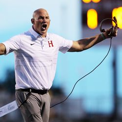 Herriman head coach Dustin Pearce screams at the sideline judge as they and Lone Peak open the 2018-19 football season at Lone Peak on Friday, Aug. 17, 2018.