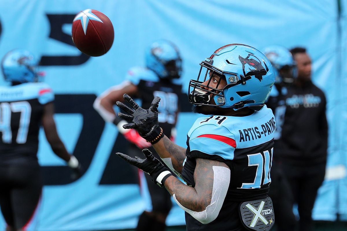Cameron Artis-Payne #34 of the Dallas Renegades catches a pass during warm ups before an XFL football game against the New York Guardians on March 07, 2020 in Arlington, Texas.