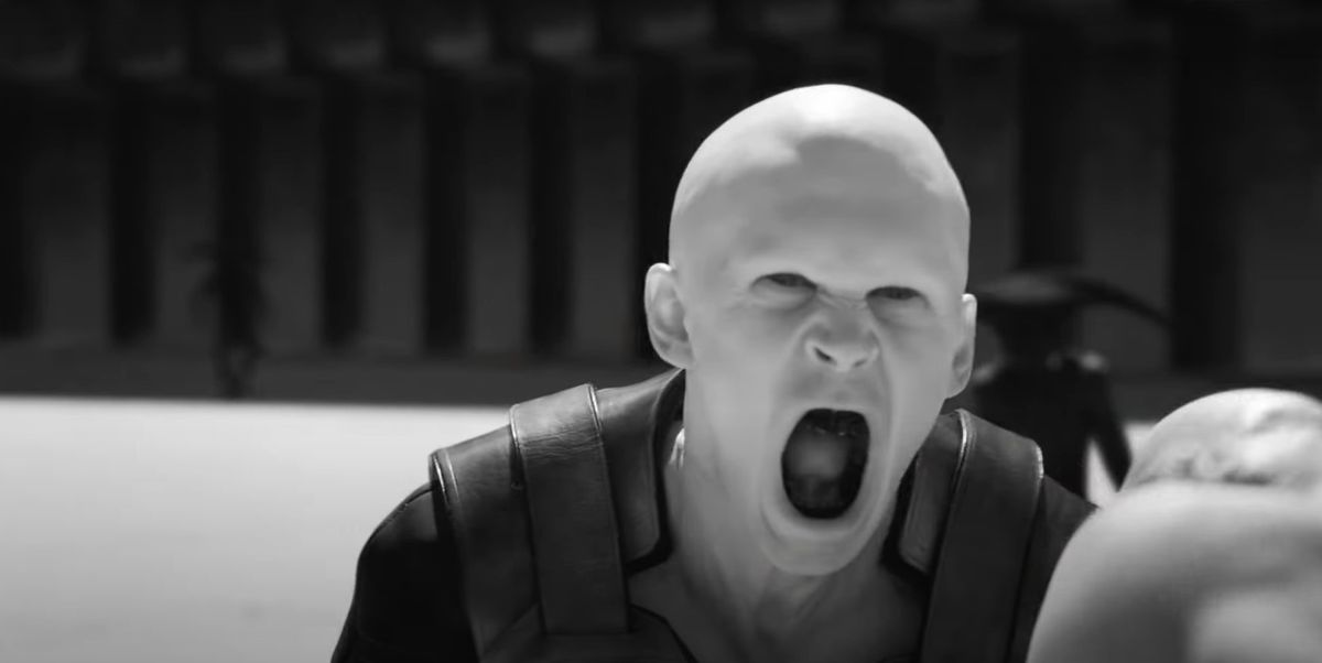Austin Butler as Feyd-Rautha Harkonnen in Dune 2, screaming in black and white with a shaved head
