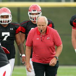 John Pease, defensive line coach, watches players execute drills during a Utah football practice at the University of Utah Aug. 19,  2010.