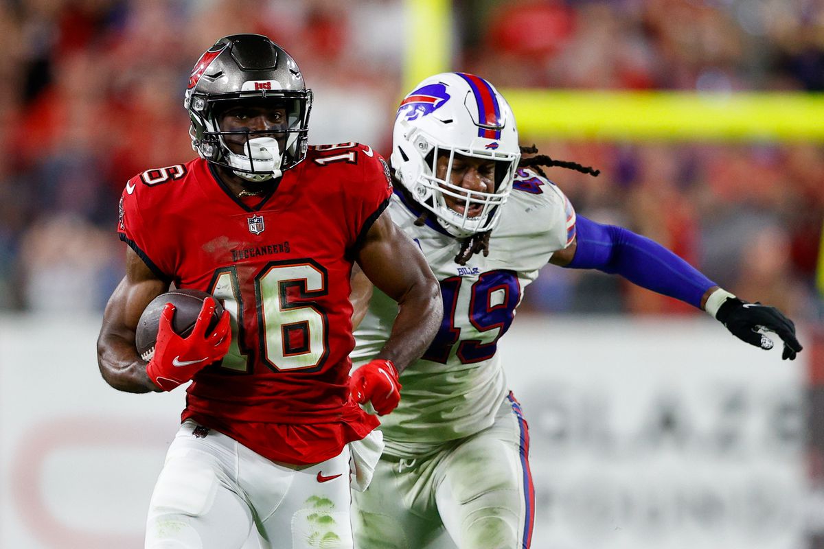 Tampa Bay Buccaneers wide receiver Breshad Perriman (16) runs past Buffalo Bills linebacker Tremaine Edmunds (49) to score a touchdown in overtime at Raymond James Stadium.