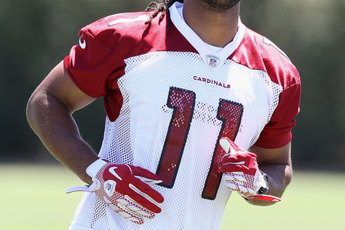 TEMPE, AZ - JUNE 13:  Wide receiver Larry Fitzgerald #11 of the Arizona Cardinals practices in the minicamp at the team's training center facility on June 13, 2012 in Tempe, Arizona.  (Photo by Christian Petersen/Getty Images)
