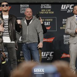 Michael Bisping and GSP pose at UFC 217 presser.