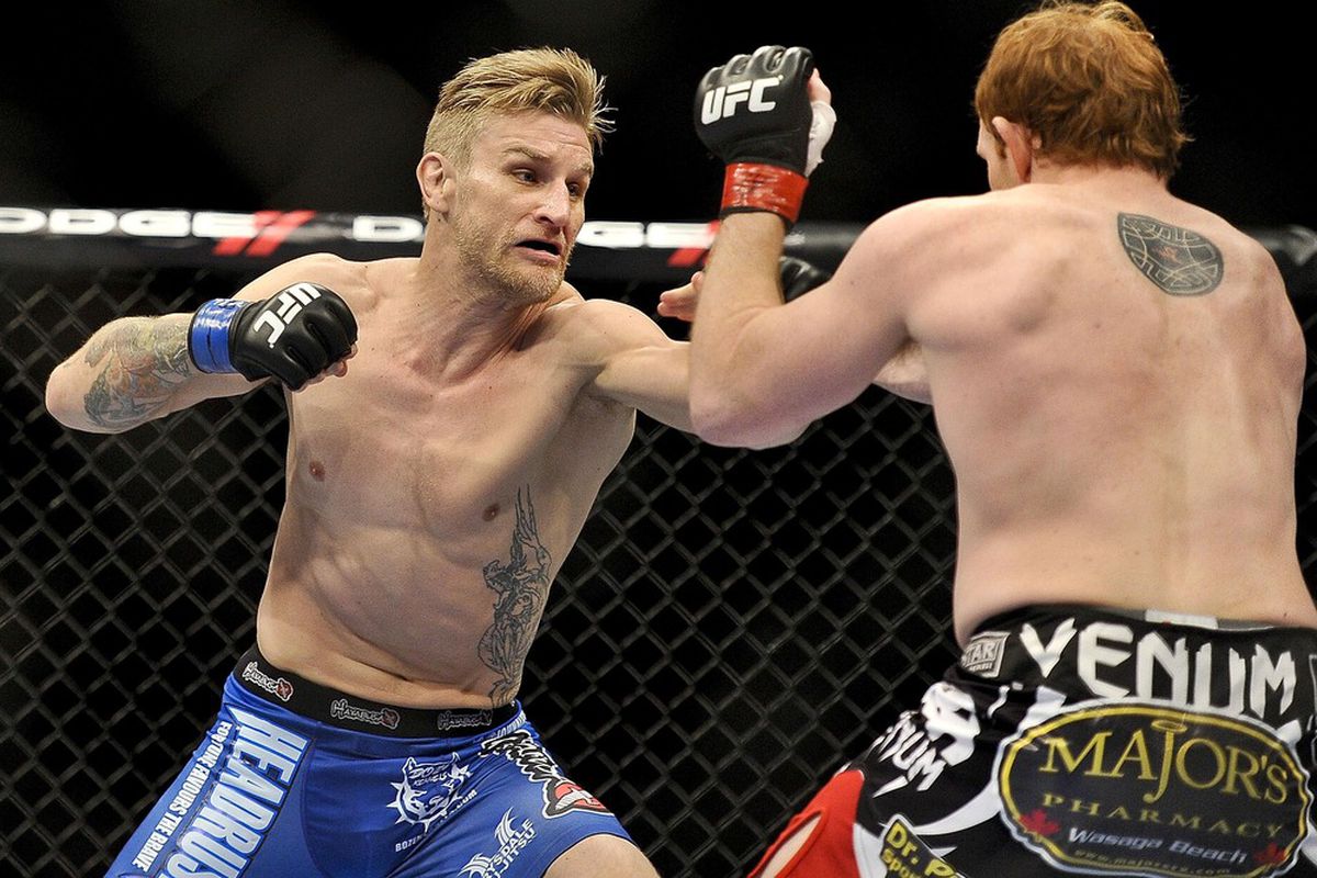 Apr 21, 2012; Atlanta, GA, USA; Mark Bocek (right) fights John Alessio in a lightweight bout during UFC 145 at Philips Arena. Mandatory Credit: Paul Abell-US PRESSWIRE