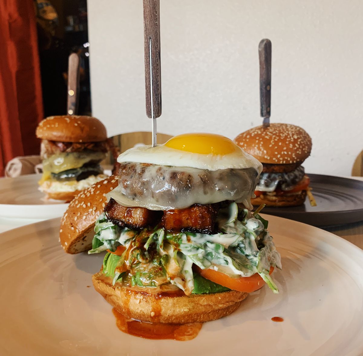 House ground burger with fried egg.