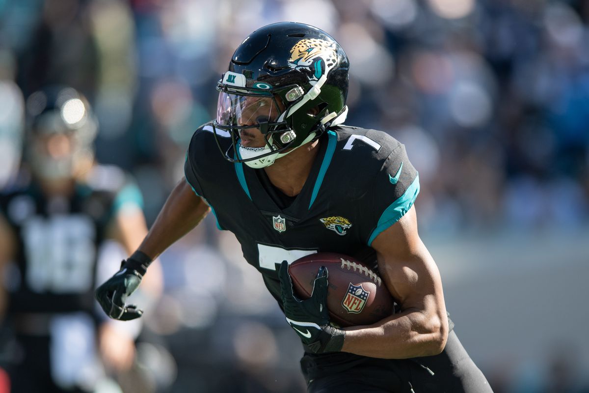 Jacksonville Jaguars wide receiver Zay Jones (7) runs after the catch against the Dallas Cowboys in the first quarter at TIAA Bank Field.