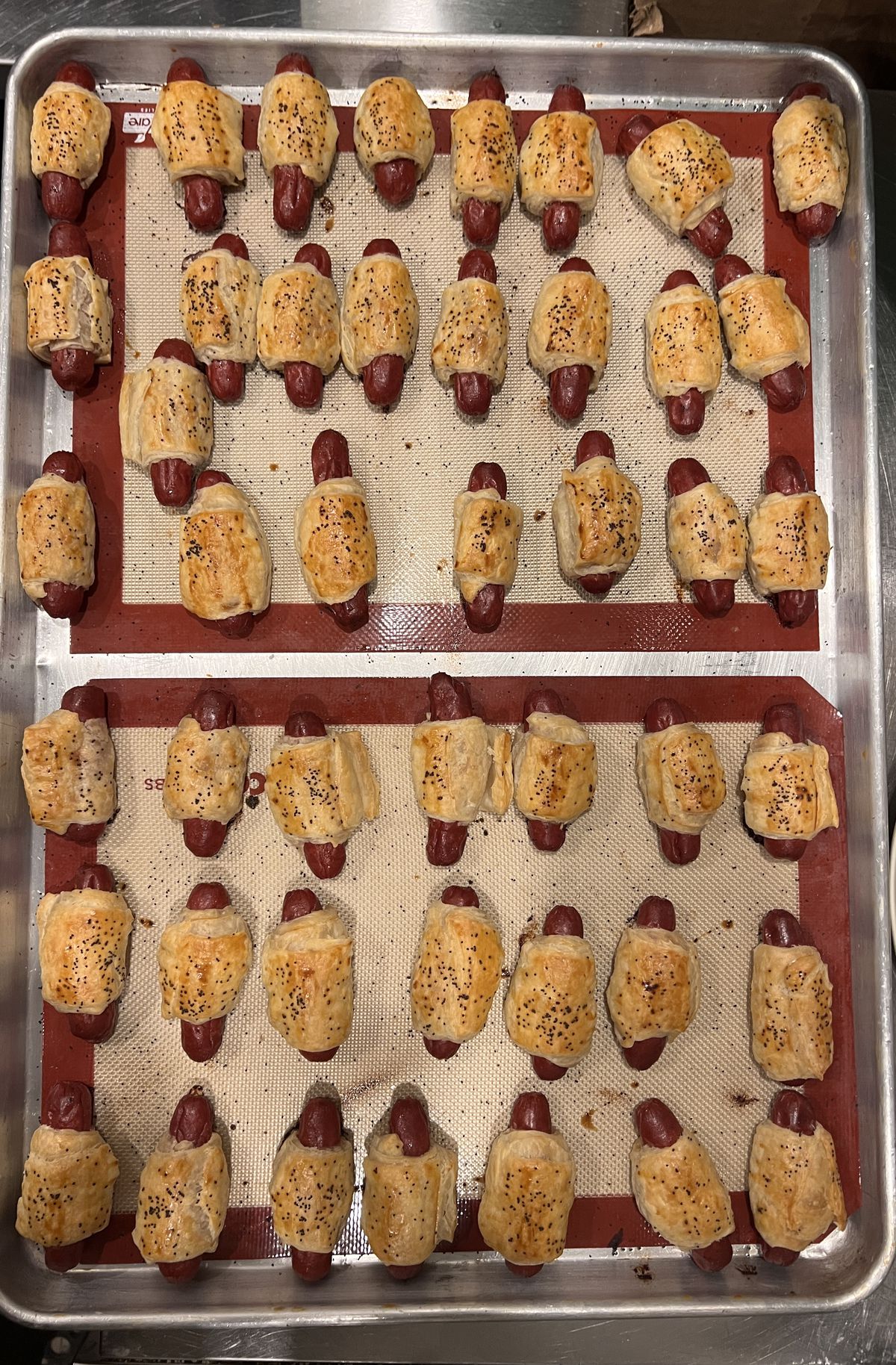 A tray of pigs in a blanket.