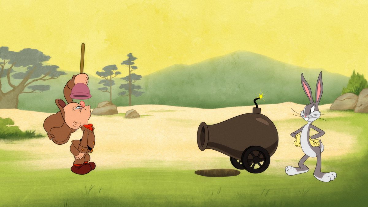 Bugs Bunny aims a cannon at Elmer Fudd as Elmer glares into a plunger in HBO’s new Looney Tunes reboot