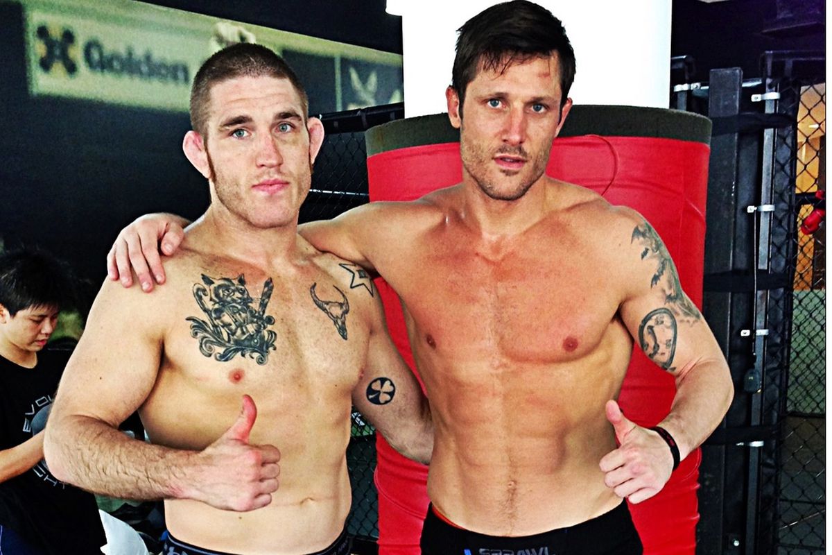 Tom Lawlor (left) and Jake Butler at Evolve MMA.