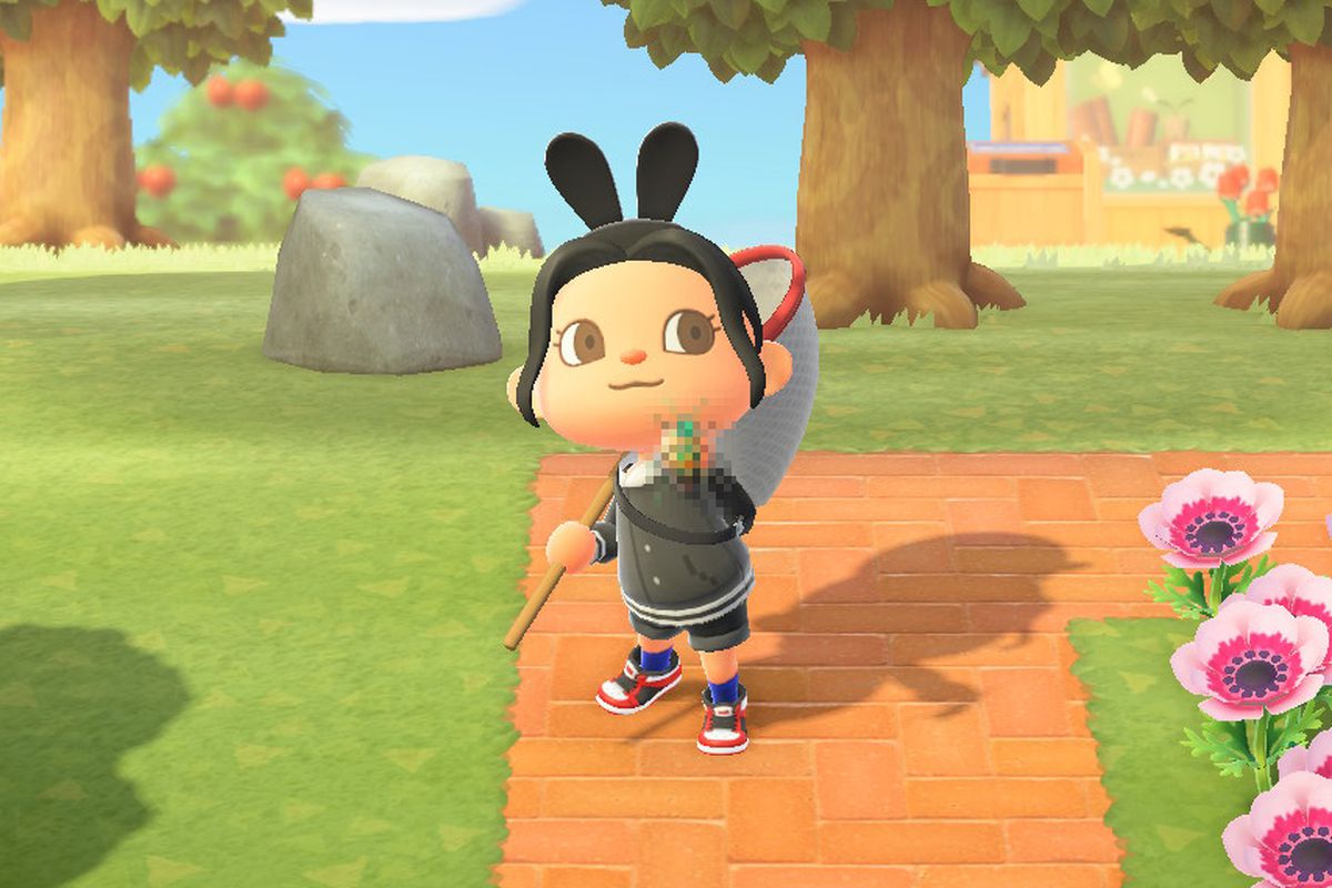 An Animal Crossing character holds up a bug, which has a mosaic censoring it.