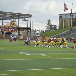 CMU leads a drive towards the Champions Center side of the stadium on their first possession.