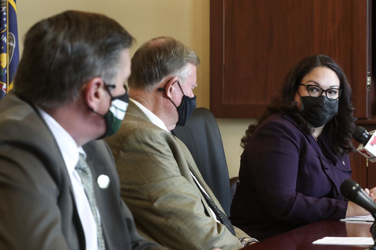 Rep. Val Peterson, R-Orem, left, Senate Majority Leader Evan Vickers, R-Cedar City, and Sen. Luz Escamilla, D-Salt Lake City, discuss SB195 in the Senate Rules Room at the Capitol in Salt Lake City on Wednesday, Feb. 17, 2021.&nbsp;The bill, sponsored by Vickers, stems from the power struggle that persisted between former Gov. Gary Herbert and the Legislature throughout the COVID-19 pandemic. Among other things, it would limit the duration of a public health order to 30 days.