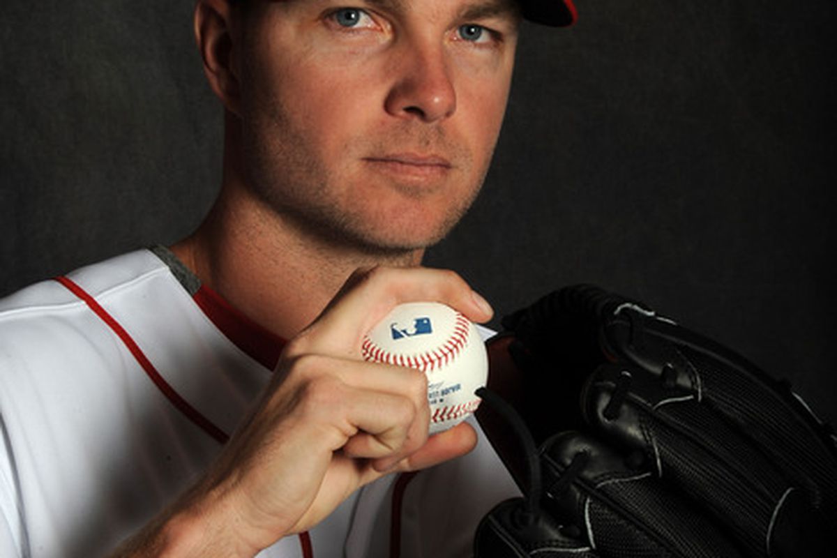 Ryan Madson poses for a portrait during the Reds' photo day. After being diagnosed with a torn ligament, it could wind up being one of the few pictures taken of him in a Reds' uniform.