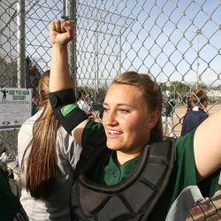 Copper Hills catcher Ashley Clayson celebrates a victory over Bingham during state tournament play.