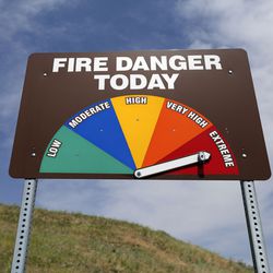 A fire danger sign shows conditions are extreme near Little Dell Reservoir on Wednesday, June 16, 2021.