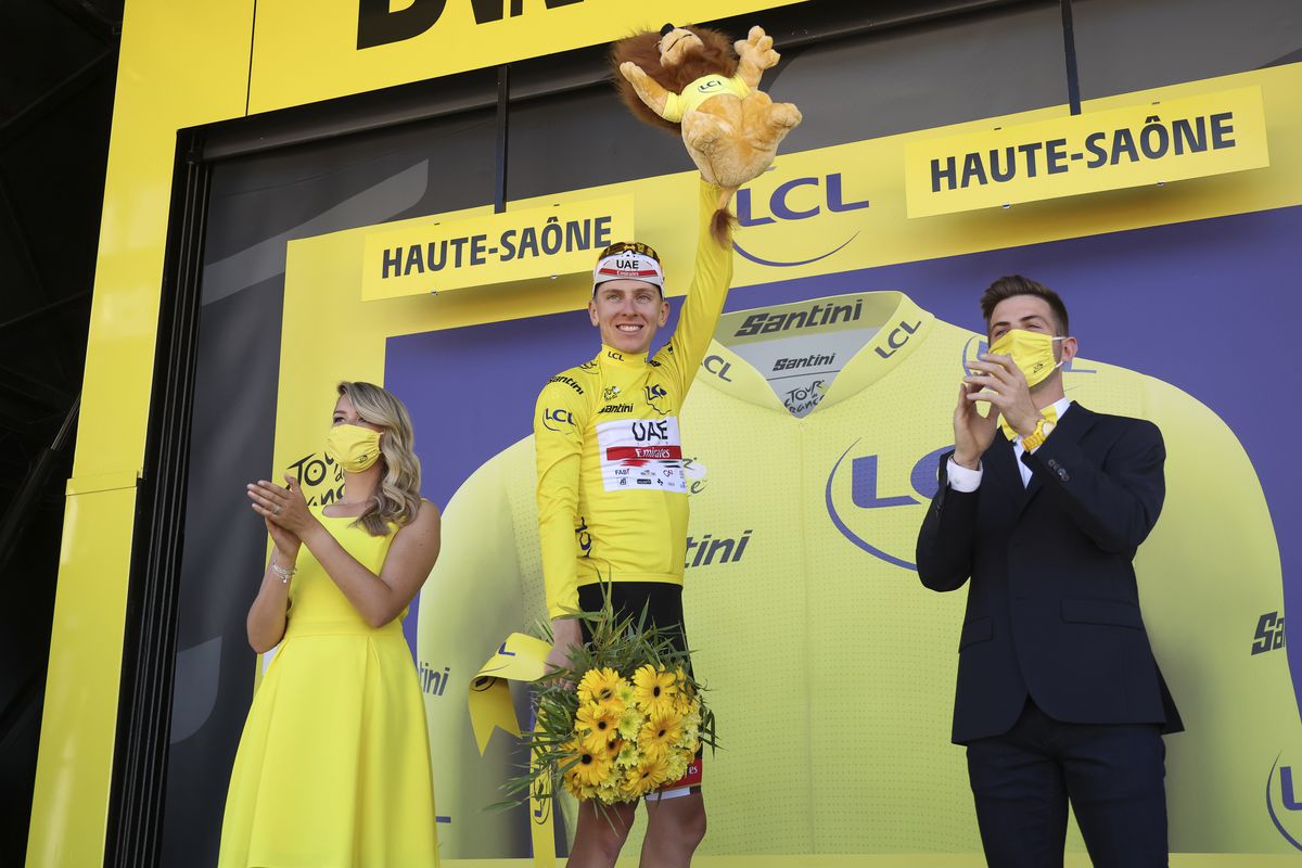 Race leader Tadej Pogacar of Slovenia and UAE Team Emirates retains the yellow jersey during the podium ceremony of the 109th Tour de France 2022, Stage 7 a 176,3 km stage from Tomblaine to La Super Planche des Belles Filles / #TDF2022 / #WorldTour / on July 8, 2022 in Planche des Belles Filles, France.