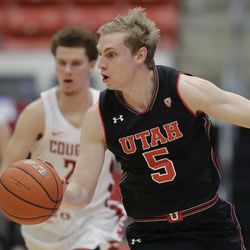 Utah guard Parker Van Dyke (5) brings the ball up during the first half of the team's NCAA college basketball game against Washington State, Saturday, Feb. 17, 2018, in Pullman, Wash. (AP Photo/Ted S. Warren)
