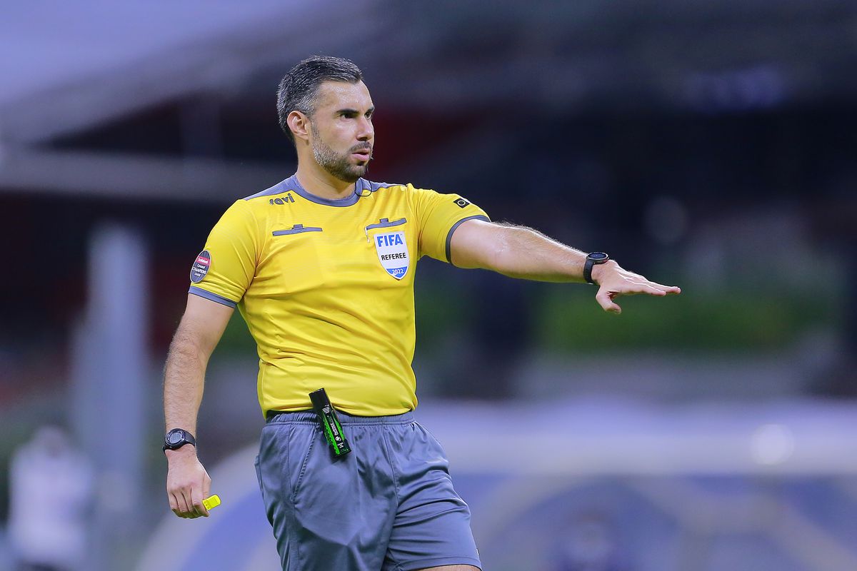 Mario Escobar, central referee, gestures during the 2nd leg semifinal match between Cruz Azul and Pumas UNAM as part of the Concacaf Champions League 2022 at Azteca Stadium on April 12, 2022 in Mexico City, Mexico.