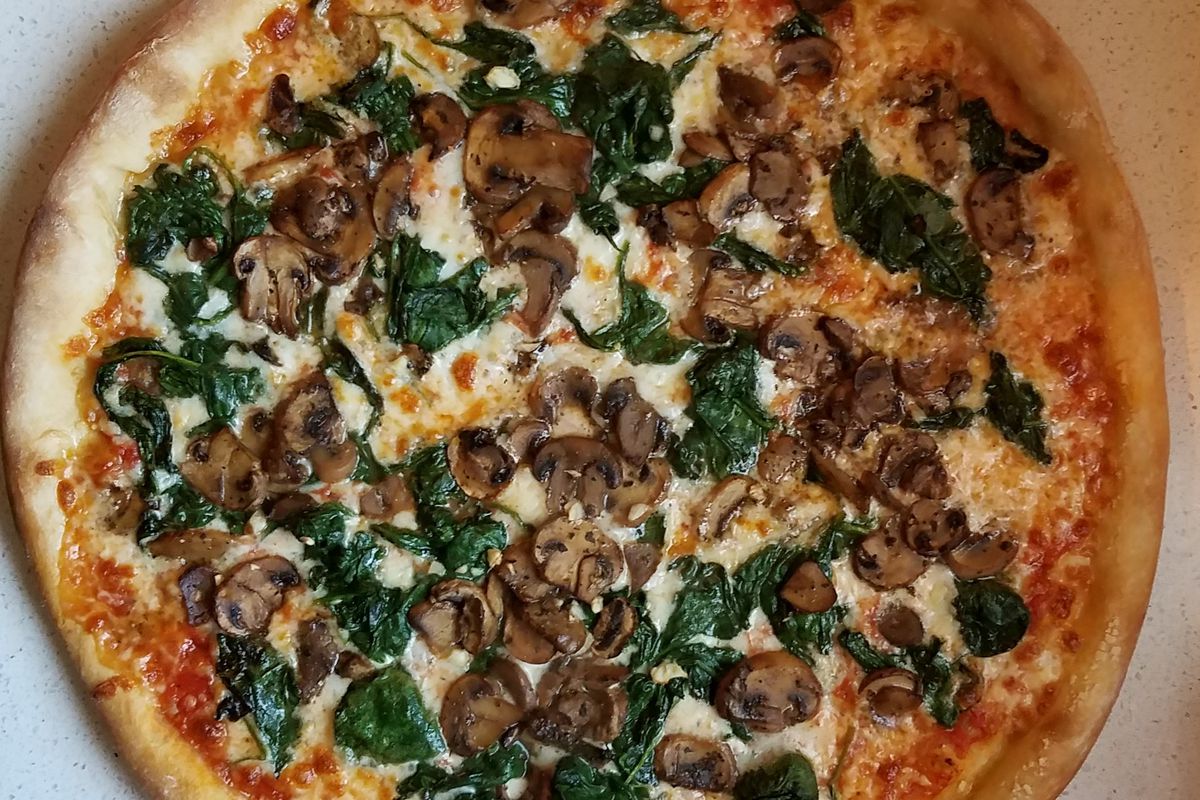 Spinach and mushroom pizza from Junior’s