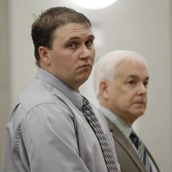 Shon Handrahan, left, appears in court Tuesday, March 17, 2015, in Farmington, with his attorney Ed Brass. Handrahan, who pleaded guilty in a case that spurred lawmakers to revise state law against so-called revenge porn, was sentenced to 60 days in jail. He pleaded guilty last month to two felony counts of distributing pornographic material. Authorities say the 31-year-old sent nude pictures of his estranged wife to her acquaintances in 2012. 