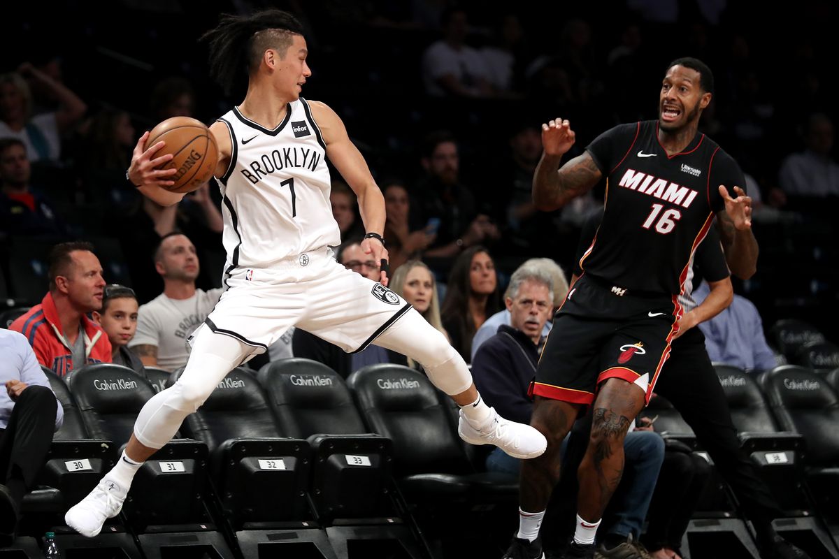 Jeremy Lin of the Brooklyn Nets jumps for the basketball in the first half against the Miami Heat